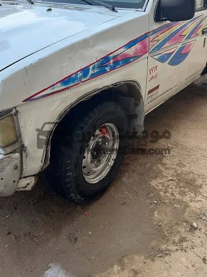 نيسان بيك أب 2000 ديزل مكنة وفتيس فوق النمرة