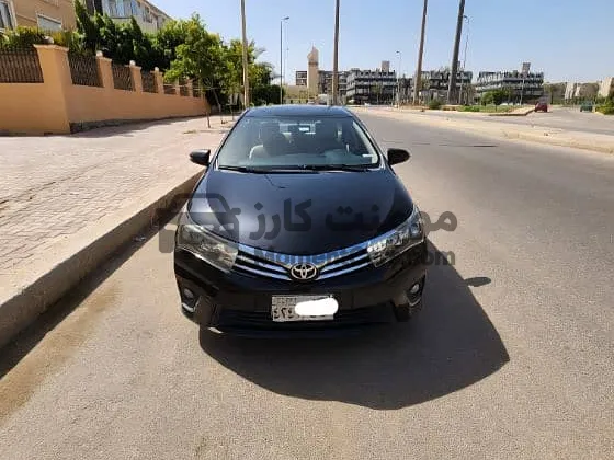 تويوتا كورولا 2014 مالك أول فرش جلد (للبيع)