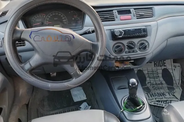 لانسر 2003 اتوماتيك مكواة - دواخل فابريكة