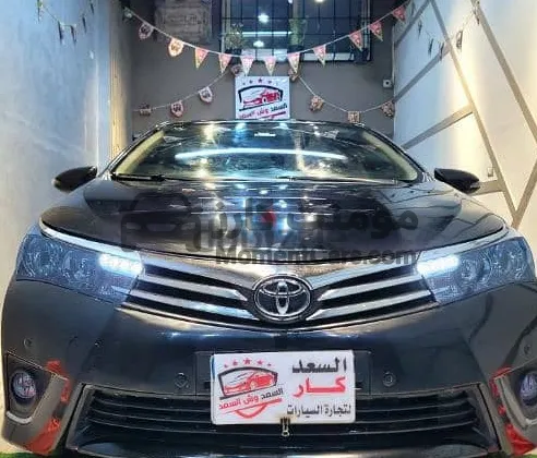 تويوتا كورولا 2015 أوتوماتيك فئة Auto Park للبيع كاش وتقسيط