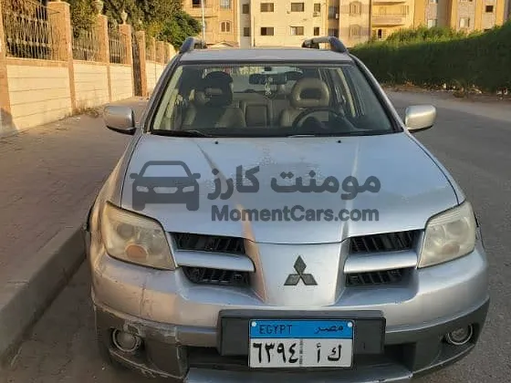 ميتسوبيشي أوتلاندر 2006 2400CC دفع كلي حالة ممتازة