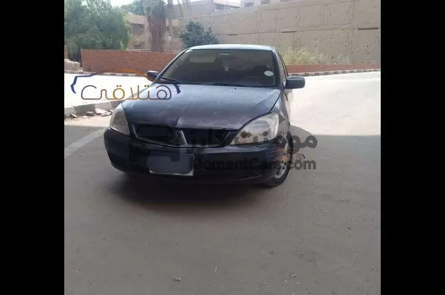 ميتسوبيشي لانسر بومة 2008 مانيوال