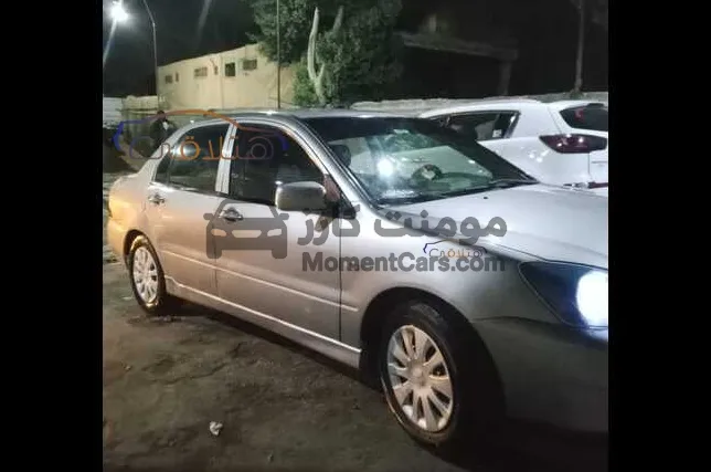 لانسر بومة 2009 اتوماتيك 1600 للبيع