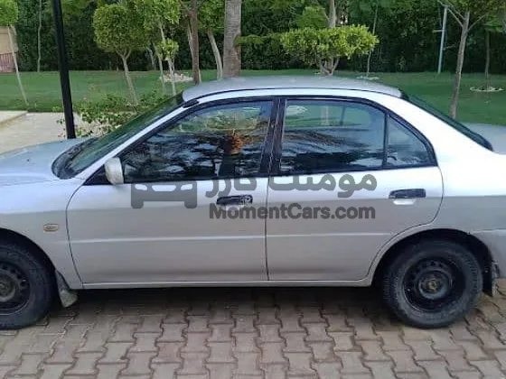 لانسر كريستاله 1999 للبيع، تاني مالك، غاز وبنزين