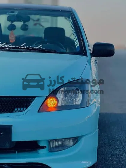 ميتسوبيشي اتراج 2005 أوتوماتيك كاملة تعديلات للبيع