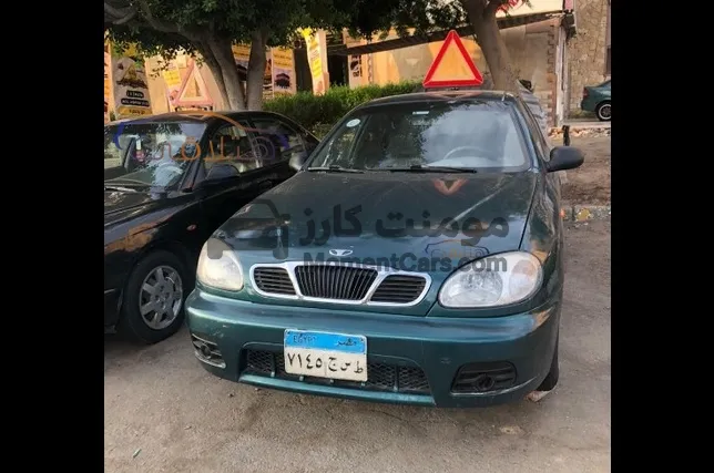 دايو لانوس 1999 مانيوال - كاوتش وبطارية جداد