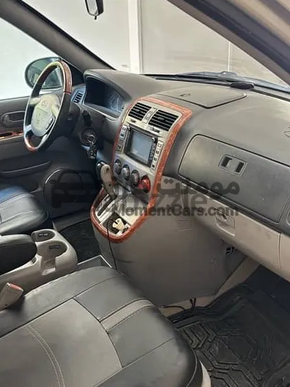 كيا كرنفال 2004 اتوماتيك فرش جلد للبيع