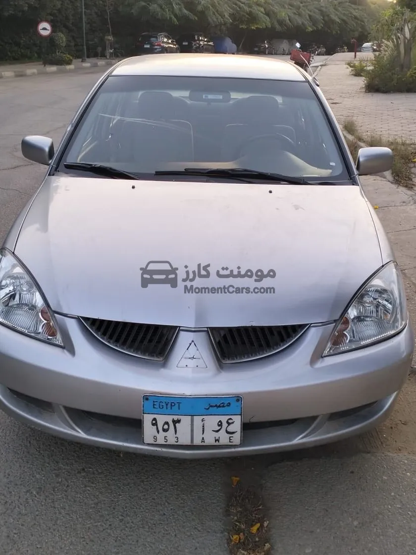 لانسر بومة 2006 مانيوال - حالة جيدة