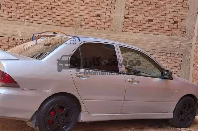 لانسر بومة 2009 اتوماتيك 1600 سي سي