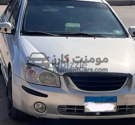 كيا سيراتو 2006 اتوماتيك جولد غاز للبيع