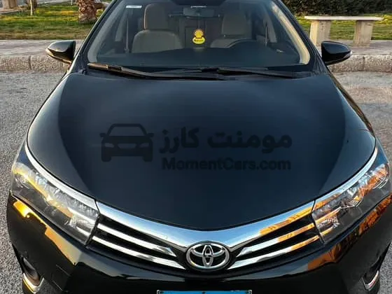تويوتا كورولا 2016 اوتوماتيك سوداء للبيع بحالة ممتازة