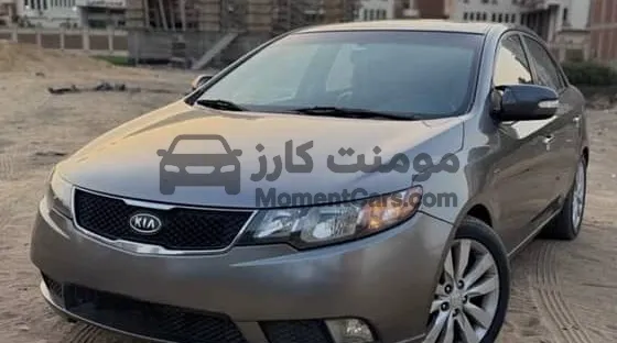 كيا فورتي 2010 كاملة فتحة سقف وبصمة للبيع