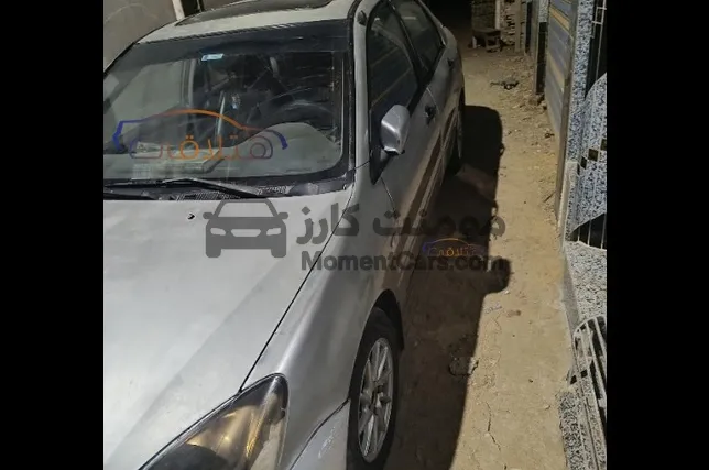 لانسر بومة 2005 اتوماتيك فبريكة دواخل