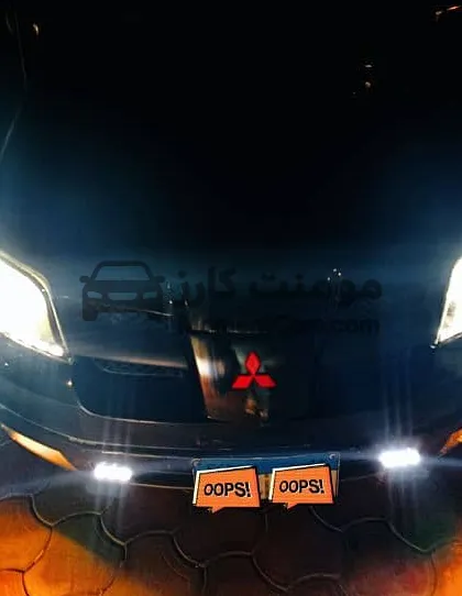 ميتسوبيشي اوتلاندر 2003 خليجي 4*4 للبيع