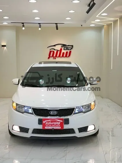 كيا سيراتو 2009 الفئة الثانية بفتحة سقف وحالة ممتازة للبيع