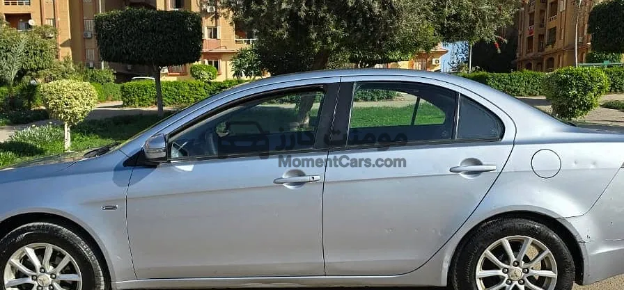 لانسر شارك 2015 اتوماتيك بحالة ممتازة للبيع