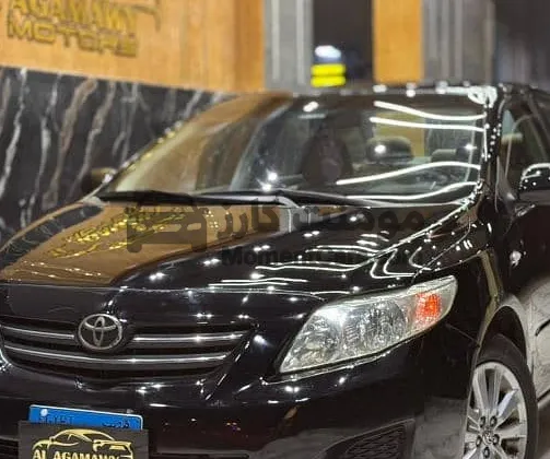 تويوتا كورولا 2009 اتوماتيك فئة تانية فرش جلد