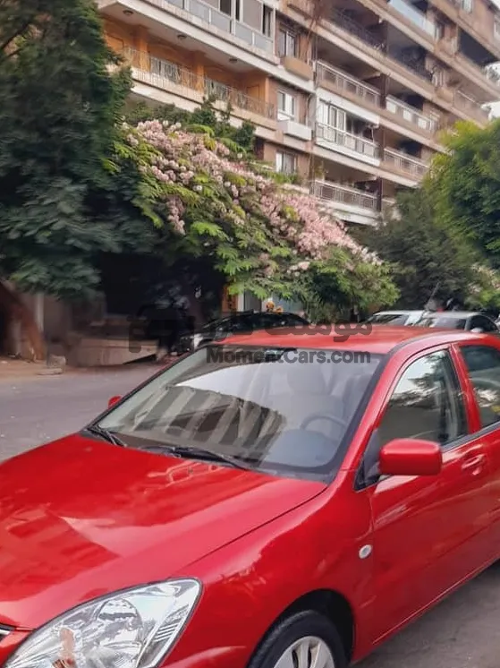 لانسر بومة 2013 اتوماتيك للبيع حالة ممتازة