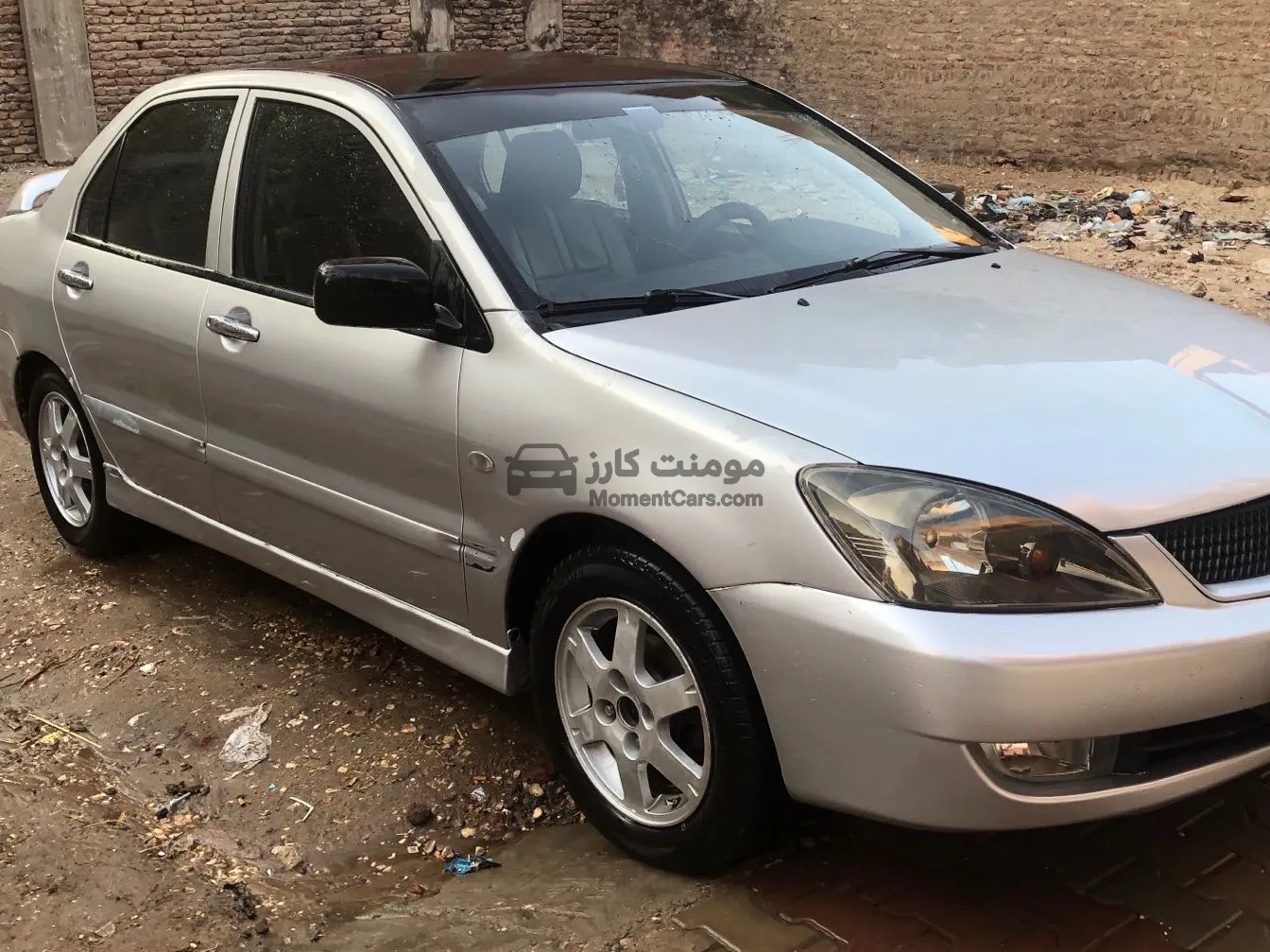 لانسر بومة 2008 اتوماتيك سوبر اكشن فتحة سقف