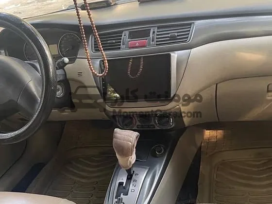 لانسر 2013 اتوماتيك فابريكة بدون بوية مالك أول