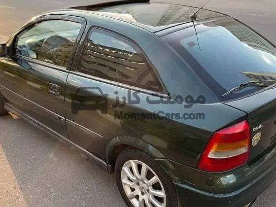 أوبل أسترا G كوبيه موديل 2000 مانيوال بحالة ممتازة