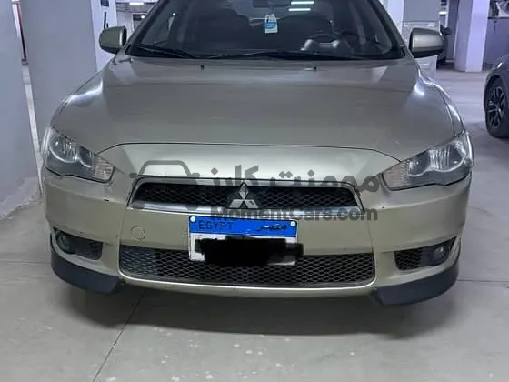 لانسر 2009 أعلى فئة فتحة سقف وبصمة فبريكة للبيع