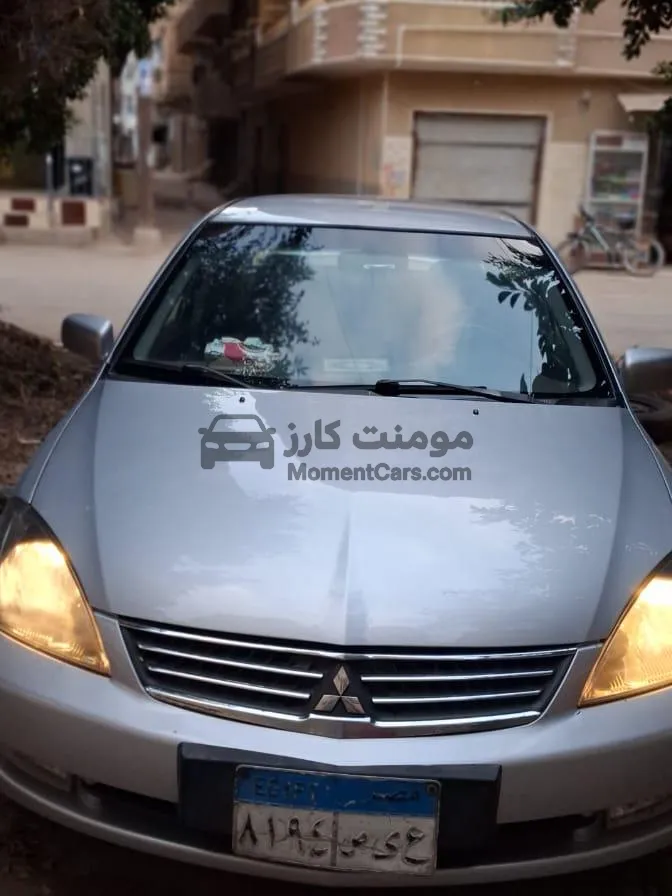 لانسر بومة 2013 اتوماتيك فبريكة دواخل وحالة ممتازة