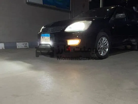 لانسر بومة 2010 اتوماتيك - سوبر اكشن - فرش جلد جديد