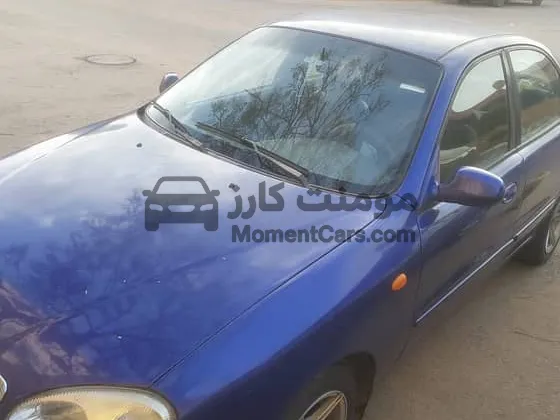 دايو لانوس 2002 فرش جلد وجنوط - رخصة سارية 2026