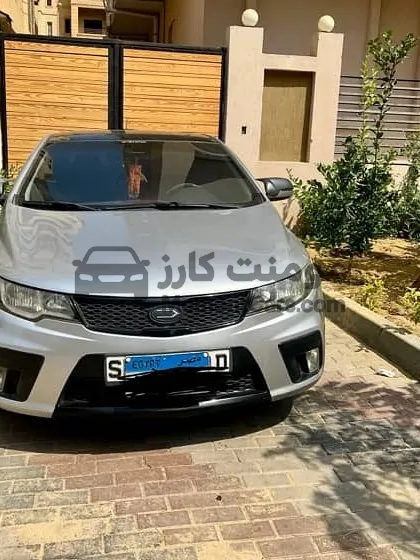 كيا سيراتو كوبيه 2011 اتوماتيك - فتحة سقف وبصمة