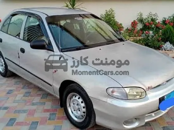 هيونداي اكسنت 2006 مانيوال 1300cc فابريكة بره وجوه