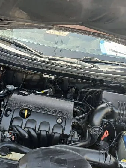 كيا سيراتو 2011 خليجي كاوتش وبطارية ومساعدين جداد