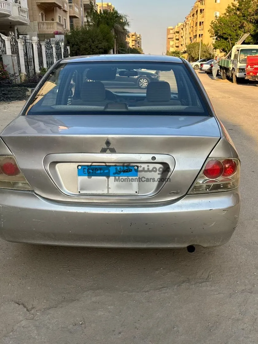 لانسر 2006 اتوماتيك 1300cc رشة بره فبريكة جوه