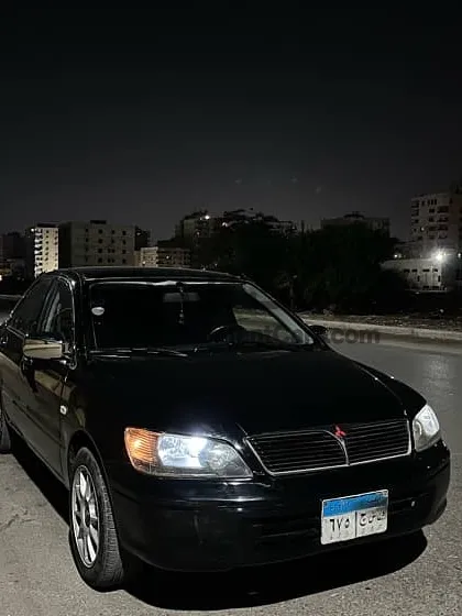 لانسر مكواه 2003 مانيوال فبريكة دواخل وصيانة كاملة