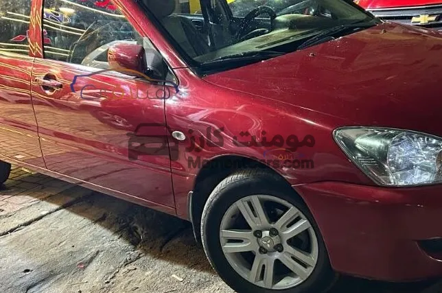 لانسر بومة 2012 اتوماتيك 110 ألف كم للبيع