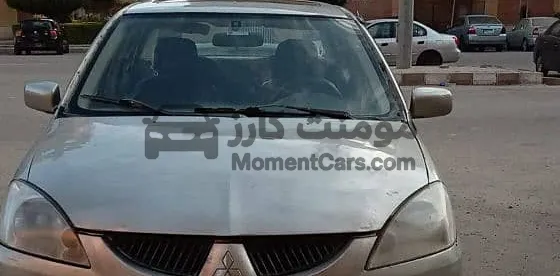 لانسر بومة 2005 اتوماتيك سوبر اكشن فتحة سقف للبيع