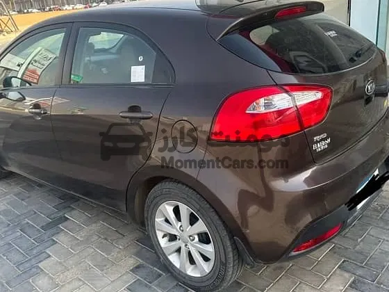 كيا ريو 2013 فابريكة أول يد 95 ألف كم أوتوماتيك