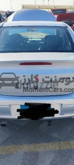 أوبل كورسا 2004 اتوماتيك - موفرة بنزين للبيع