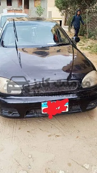 لانوس 2011 مانيوال فرش جلد بطارية وجنوط وعفشة جديدة