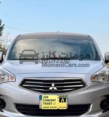 ميتسوبيشي اتراج 2015 اتوماتيك فابريكة 135 ألف كم