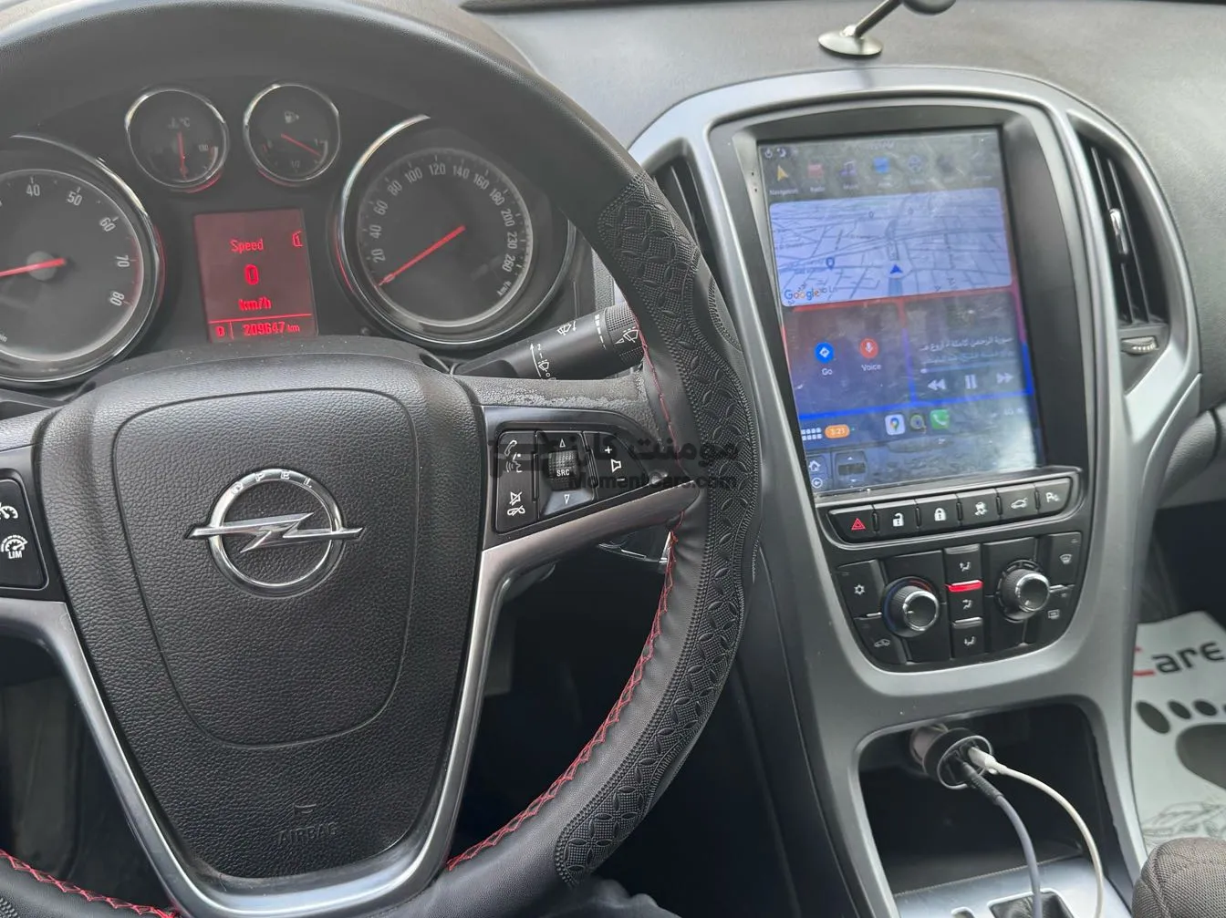 اوبل استرا 2013 اتوماتيك - شاشة تسلا وكاميرا 4K للبيع