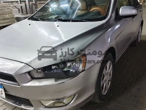 لانسر شارك 2014 اتوماتيك فابريكة عدا اكصدام خلفي