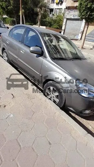 كيا ريو 2010 مانيوال فابريكة أول يد 1400cc