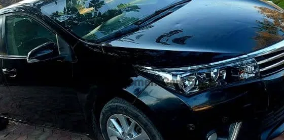 تويوتا كورولا 2015 كاملة اوتو بارك - فبريكة بالكامل