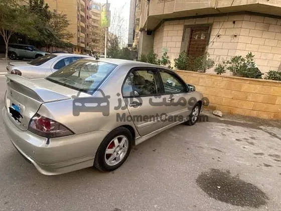 لانسر بومة 2007 هاف سبورت خليجي اتوماتيك بحالة ممتازة