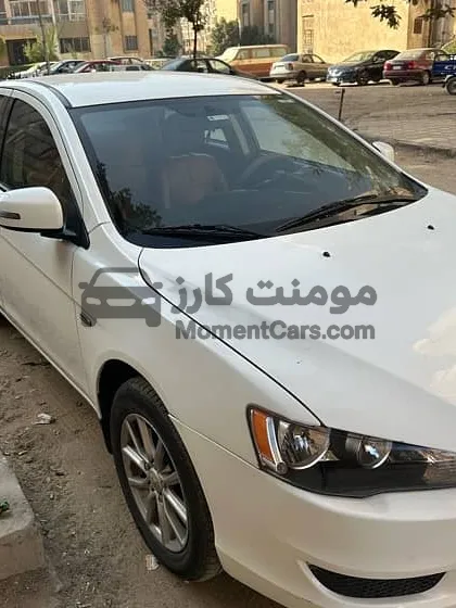 لانسر 2016 تاني فئة جنوط واسبويلر للبيع