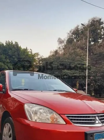 لانسر بومة 2013 اتوماتيك حالة ممتازة للبيع