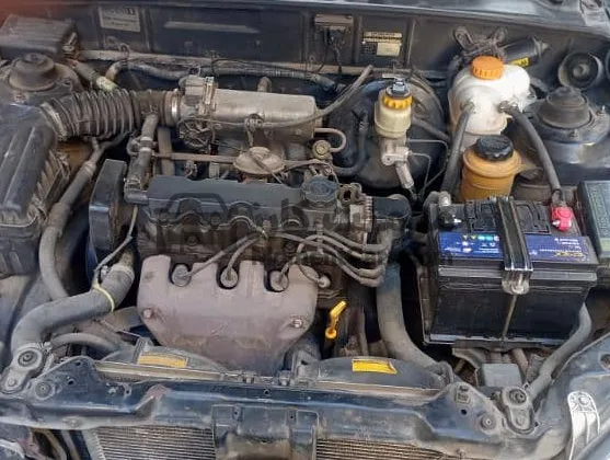 شيفروليه لانوس 2011 مانيوال كاوتش وبطارية وجنوط اسبور