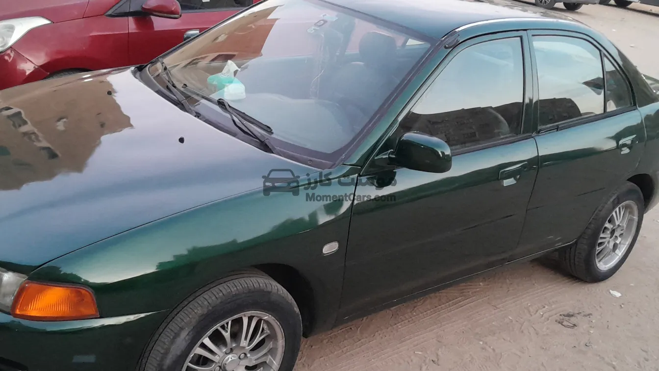 لانسر كريستالة 1998 مانيوال فابريكة دواخل للبيع